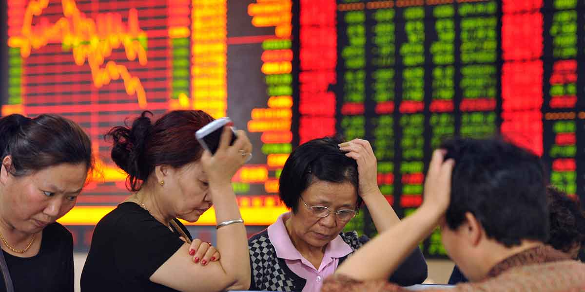 Börslyft i Hongkong men tungt i Shanghai